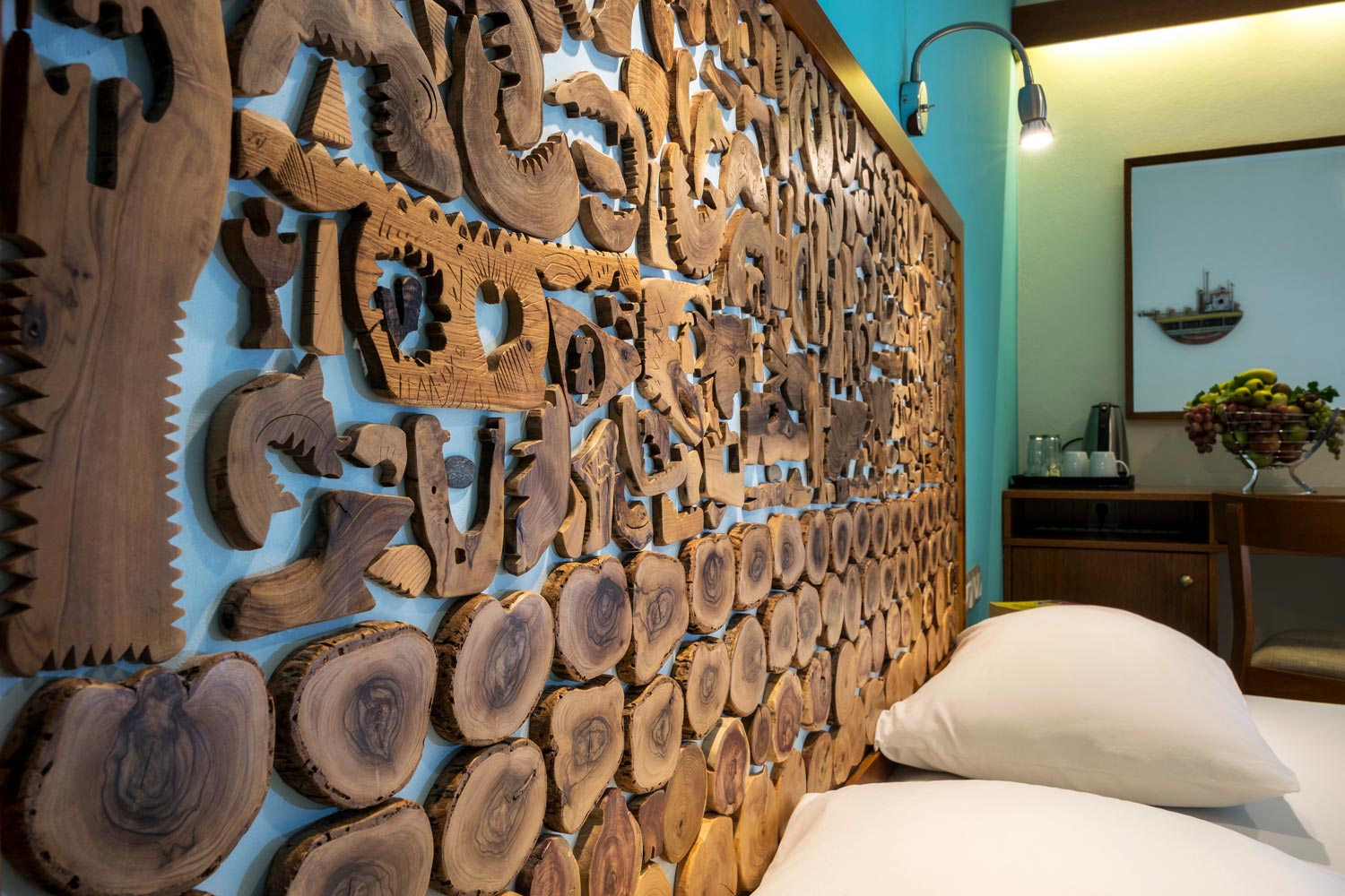 Handmade wooden art at beds headboard 