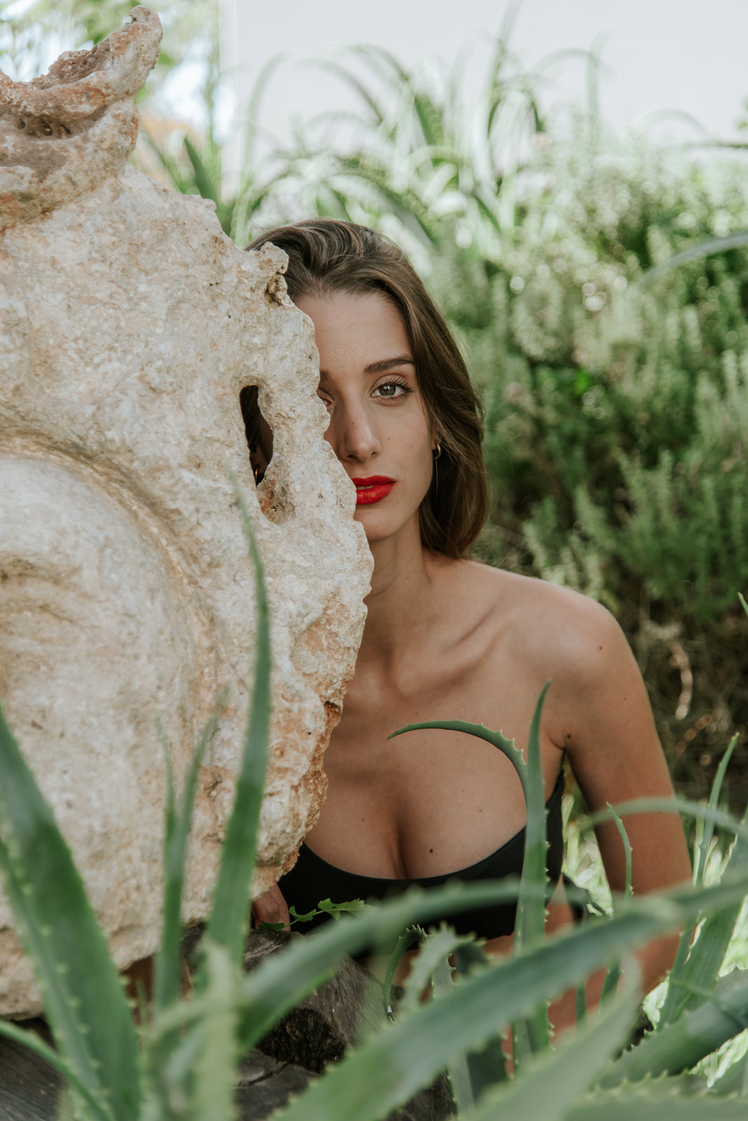 Woman posing at hotel's garden