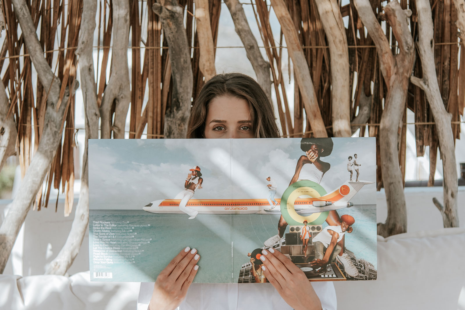 Woman holding vinyl record 